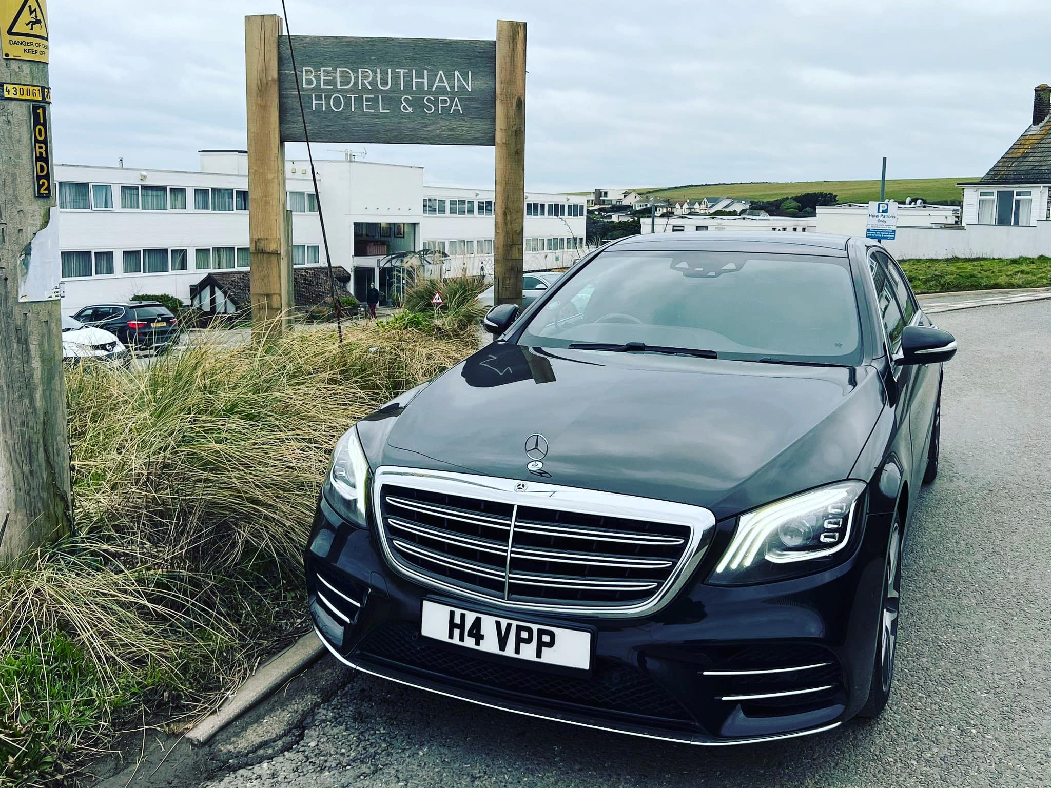 black mercedes outside hotel in cornwall